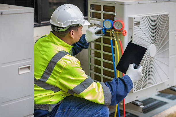 Professional Ac Installation technician working in Falls City, OR